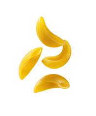 Shiny, golden crescent pasta pieces floating in dark space