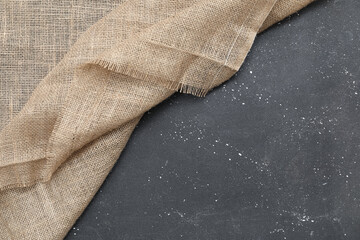 Burlap cloth on dark background