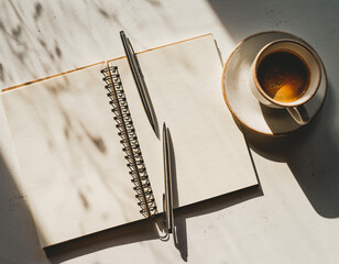 Closeup of a cup of coffee on a desk with a blank notebook, pen, and document, perfect for business, work, or cafe settings