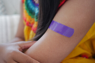 Child receives bandage on arm after minor injury