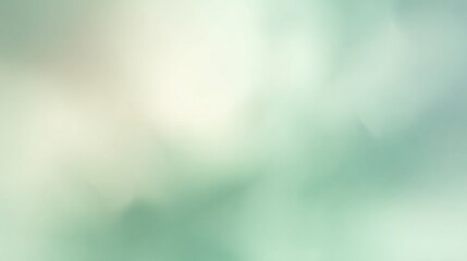 Obraz premium A soft, blurred background blending shades of green and white, creating a calming and serene atmosphere.