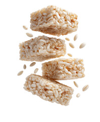Stacked rice treats with scattering seeds in midair