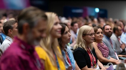 Engaged Audience at a Conference, Captivated Participants Listening Attentively