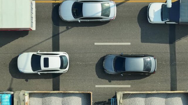 Drone view shows multi-lane traffic congestion, reflecting rising vehicle demand, mobility inefficiency, road capacity limits, urban planning challenges, and the need for smarter transport solutions.
