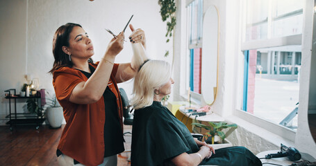 Haircut, scissors and styling with people at salon for appointment, consulting or treatment. Service, trim and window with hair stylist and mature customer in boutique for maintenance or restoration
