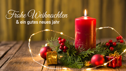 Festive christmas wishes: traditional german d&eacute;cor with red candle, ornaments, and fairy lights