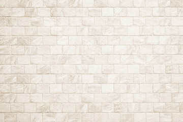 Detail of modern cream brick wall background photo. White light brick wall texture background for stone tile block painted in beige light color wallpaper modern interior and exterior backdrop design.