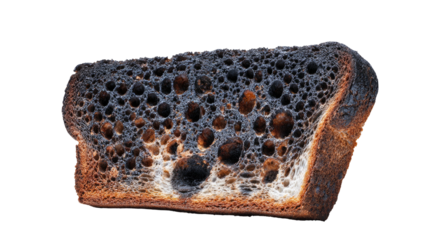 Burnt toast slice, dark and porous texture