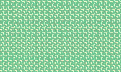 細いジグザグした山が斜めに並ぶ緑色の壁紙