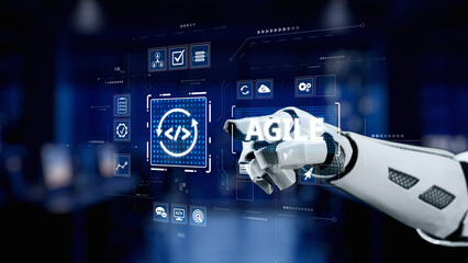 A futuristic robotic hand engages with a digital interface, highlighting agile development concepts in a modern workspace, symbolizing innovation and technology evolution. Synapse