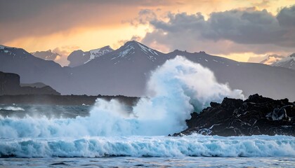 Dramatic coastal scene with crashing waves, rugged cliffs, and snow-capped mountains under a stormy, golden-hued sky