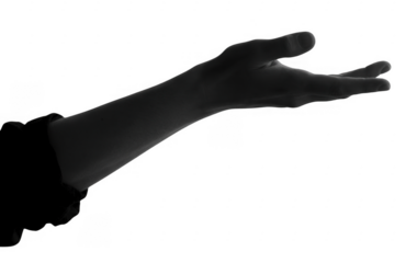 Silhouette of a human arm and open hand reaching upwards isolated on a transparent background