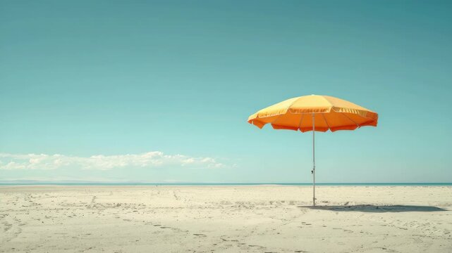Single yellow beach umbrella on serene empty
