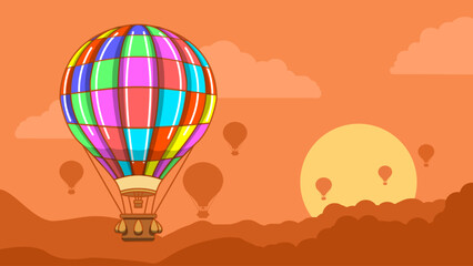 Fototapeta premium A hot air balloon flight at sunset to commemorate the first manned balloon flight. Balloon Ascension Day, January 9th
