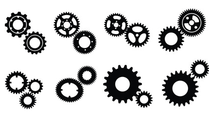 A collection of black and white gears arranged in a scattered pattern