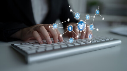 A focused view of hands typing on a sleek keyboard, enhanced by floating digital icons that symbolize innovation and connectivity in a contemporary office setting. Tessel