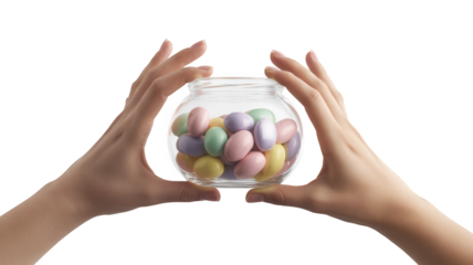 Hands holding a glass jar filled with pastel colored easter eggs isolated on transparent background