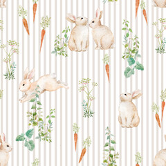 Watercolor seamless pattern with cute bunnies, carrots and green herbs on beige stripes. Hand-painted spring design perfect for nursery wallpaper, Easter decor, fabric and wrapping paper.