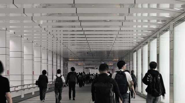 Tokyo Scene :  Walking Through the Pedestrian Underpass That Connects to the Terminal Station During Rush Hour  |  Shinjuku, Tokyo, Japan