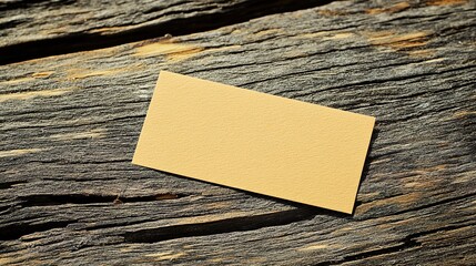 notecard. A single blank notecard angled on a rustic wooden surface with warm natural lighting. lifestyle magazines, social media lookbooks, designed for influencer and brand collaborations.