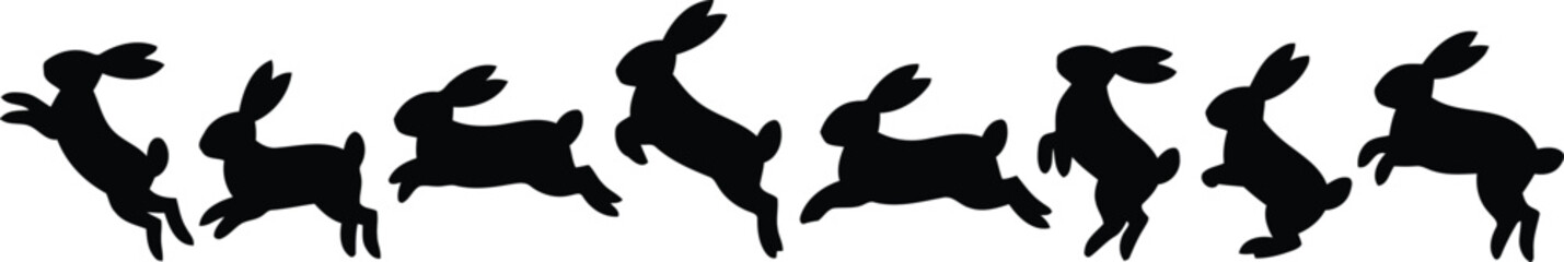 A fun collection of playful black rabbit silhouettes hopping and standing on a clean white background