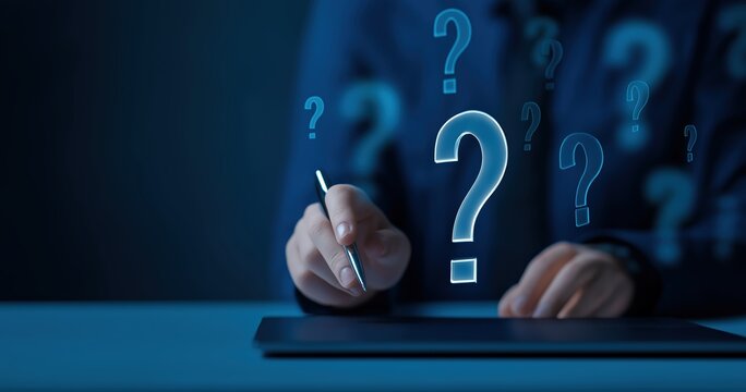 Blue question marks with person holding pen over tablet for problem solving and decision making concepts on dark background - Powered by Adobe