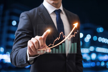 Businessman interacting with a digital financial chart showing business growth on a blurred city background