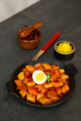 Spicy Korean Tteokbokki with Egg and Pickled Radish
