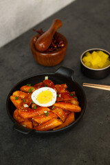Spicy Korean Tteokbokki with Egg and Pickled Radish