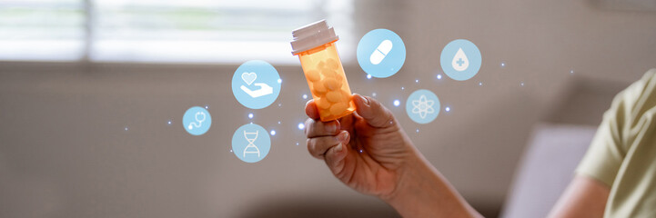 Adult hand holds prescription medication bottle digital health icons symbolizing pharmaceutical...