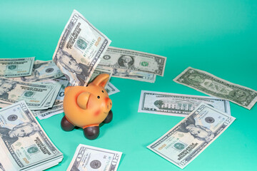 A piggy bank overflowing with cash, symbolizing financial concepts like savings and economic prosperity, set against an illustrative background.