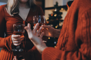Festive Office Christmas Party with Delicious Food. A beautifully decorated office space with Christmas trees and festive lights, set up for a holiday party.