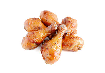 Grilled chicken legs on white background.