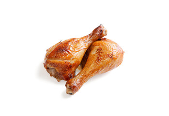 Grilled chicken legs on white background.