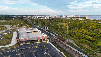 a passenger train passing claymont station on northeast corridor near wilmington, delaware