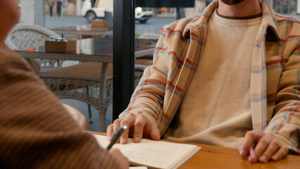 University students studying together at table