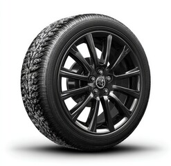 Obraz premium Black Winter Tire with White Threads Displayed on Transparent Background for Automotive Stock Photography