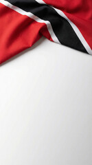 A close-up of the Trinidad and Tobago flag draped on a white surface, perfect for artistic presentations or cultural design projects.