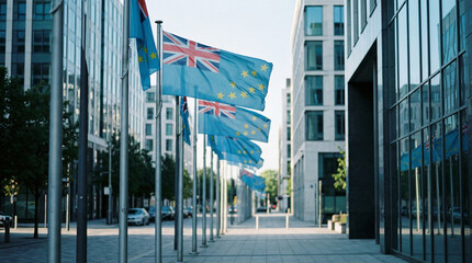 A line of flags, including UK and EU symbols, adorns a modern street with contemporary architecture and greenery, suitable for civic pride.