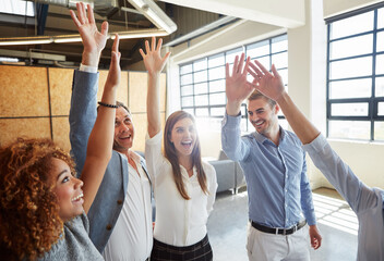 Happy, business and people cheering in office for good news, real estate success and celebration. Smile, staff or team achievement for property deal, realtor motivation and sales milestone of auction