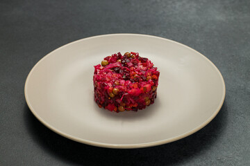 Classic Russian Beet Salad with Mustard Seeds on Plate. Vinaigrette