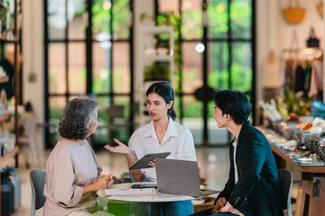 Asian Male Investor Signing Partnership Agreement at Family Ceramic Store