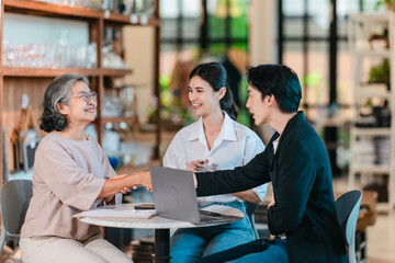 Asian Male Investor Signing Partnership Agreement at Family Ceramic Store