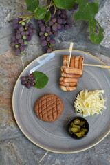 Modern style raw gourmet tartar from beef file and butter