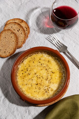 Grilled Provolone cheese, argentinian provoleta.