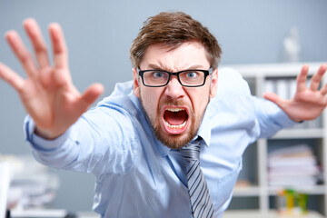 Naklejka premium Man pacing and gesturing aggressively in an office environment Generative AI