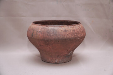 An old cast iron pot for cooking in the oven