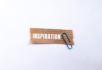 Inspiration message written on ripped torn paper background. Conceptual Inspiration symbol. Copy...