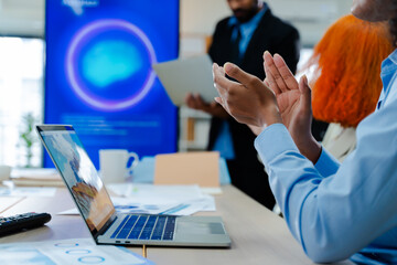 Diverse creative team use Ai Assistant (artificial intelligence assistant) on AI-assisted display for Marketing Data Analyst meeting at office.Coding team,develop Ai Assistant,business brainstorming