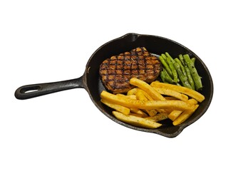 Grilled steak with french fries and green beans served in a black cast iron skillet on a white background.